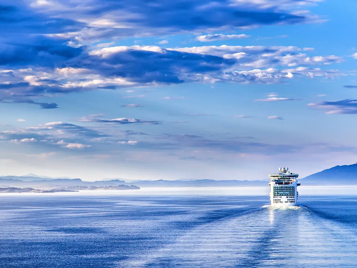 Cruise ship sailing away. Resorts, cruises, guided tours and more.