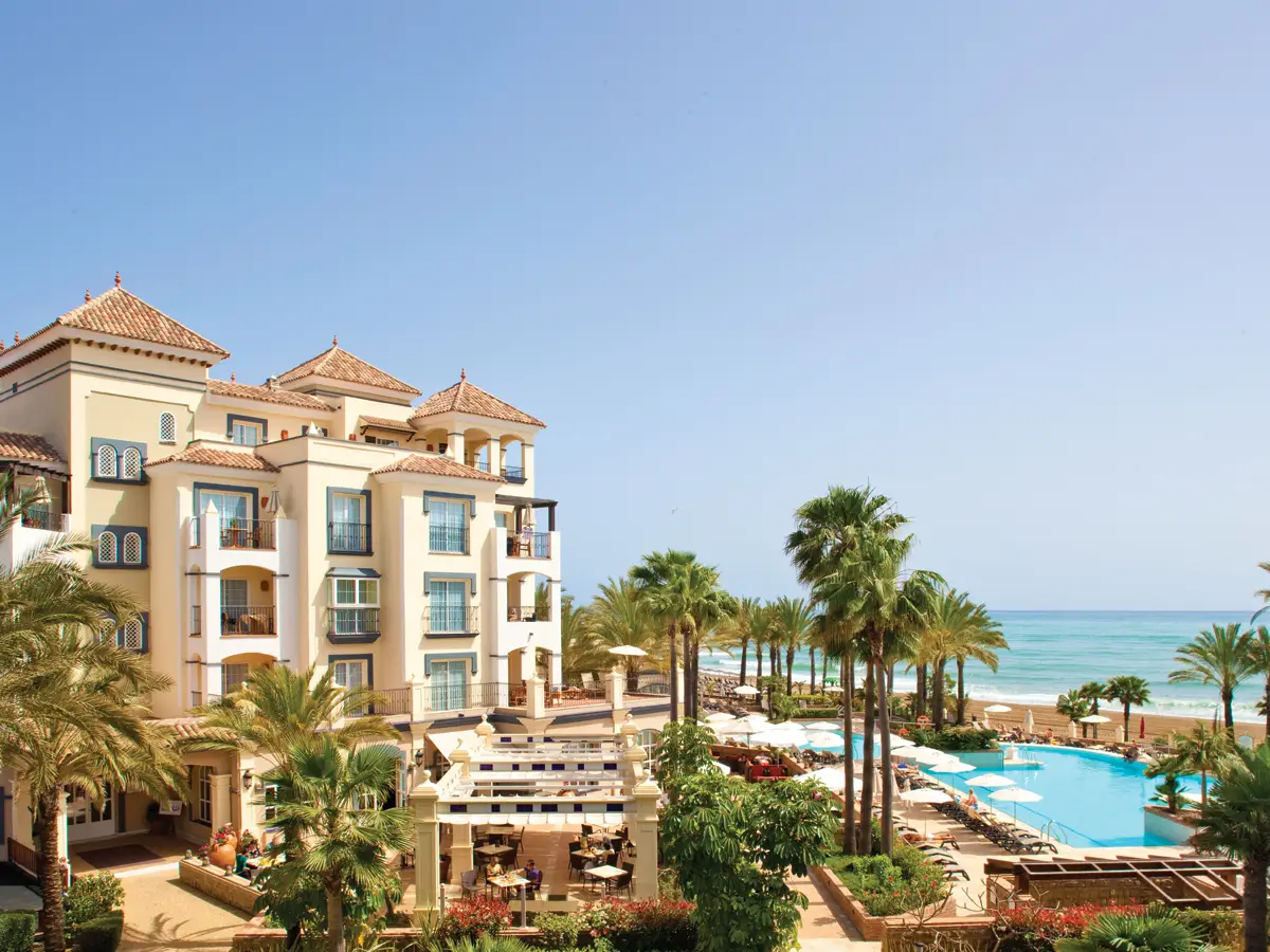 Marriott's Playa Andaluza, Costa del Sol, Spain resort exterior featuring blue pool, palm trees, and beach front.