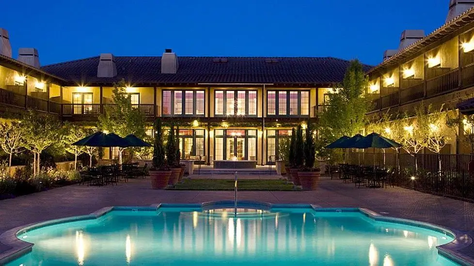 The Lodge at Sonoma Resort, Autograph Collection exterior courtyard with pool at dusk