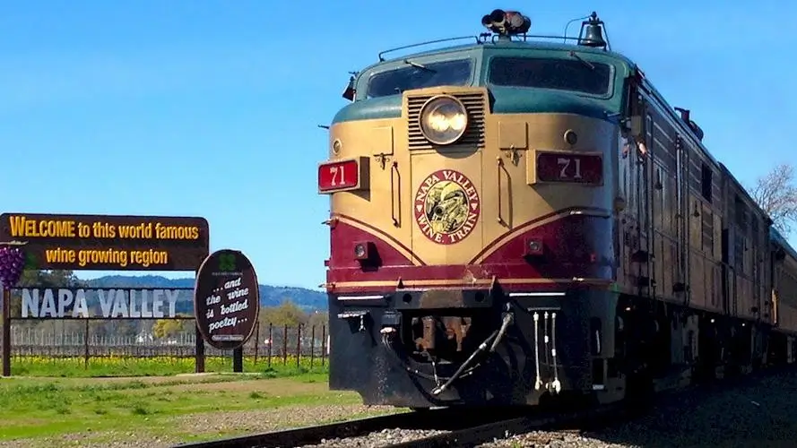 Wine Train Culinary Sojourn train engine on the tracks under blue skies