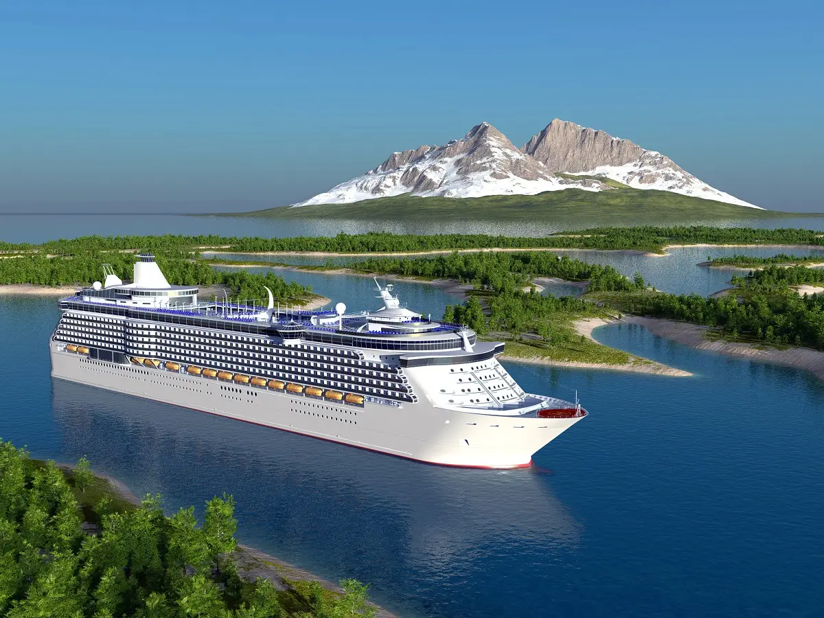 Large cruise ship floating in a channel with ocean and mountain in background